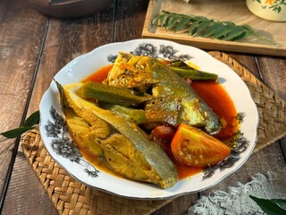fish head curry or known as kari kepala ikan bawal is a famous Malaysian dish to eat with white rice