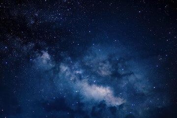 Naklejka na ściany i meble The Milky Way surrounded by celestial clouds and stars