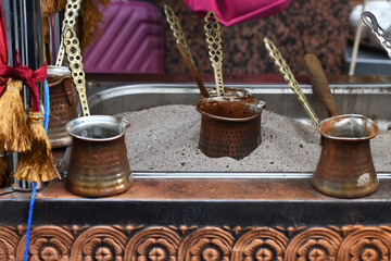 Ember Turkish coffee. Roasted Turkish coffee. Traditional nubian coffee making. Coffee turk on the coal. - 712300980