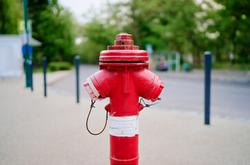 Fototapeta na wymiar Red fire hydrant for emergency fire access.