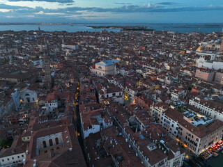 Venice panoramic cityscape landmark at sunset or night, aerial view of Piazza San Marco