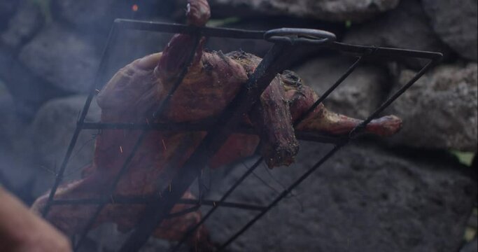 lamb asado barbecue in south america