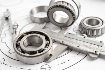 Engineering tools and mechanical industrial with vernier caliper and metal ball bering.