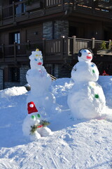 Snowman family  by winter 