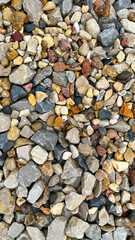 Small sandstone stones on seashore. Texture, Preset, Selective Focus
