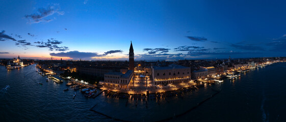 Venice panoramic cityscape landmark at sunset or night, aerial view of Piazza San Marco