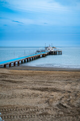 Lignano Pineta. the pier overlooking the sea and its spiral shape. - 712327565