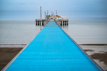 Lignano Pineta. the pier overlooking the sea and its spiral shape. - 712328183