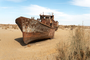 Rusting shipwrecks on what used to be the seabed of the Aral Sea. The Aral Sea has lost significant...