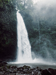Waterfall with powerful flow in  Indonesia. One of most powerful waterfalls in Bali