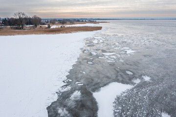 Frozen Lake Dabie in Poland in winter, rural landscape from a drone in winter.