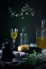 Still life with baklava on the background of liqueur