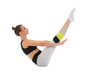 Young woman doing yoga on white background