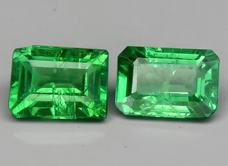 natural green tsavorite garnet gem on the background