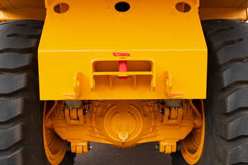 Safety and insurance lock for towing a quarry dump truck