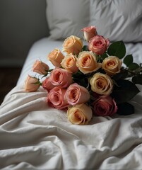  a bouquet of roses arranged on a simple white fabric