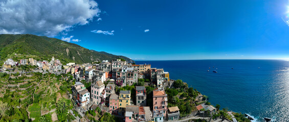 Manarola Village Cinque Terre Coast Italy. colorful town in Liguria one of five Cinque Terre. Manarola traditional Italian village in the National park Cinque Terre, with multicolored houses on rock - obrazy, fototapety, plakaty