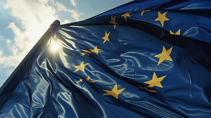 The flag of EU flutters in the wind against a bright blue sky. Created with Generative Ai technology.