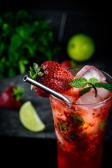 Strawberry mojito cocktail in a glass
