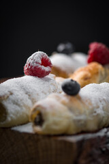 Dessert with powdered sugar and berries