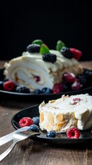 Meringue roll with wild berries