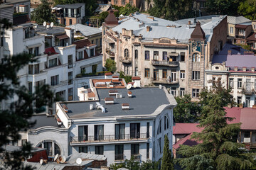Top view of the old part of Tbilisi. Roofs of Teflis. sunny summer day. Capital of Georgia.