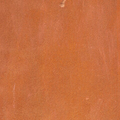 Colorful wall plaster of a facade in Venice, Italy