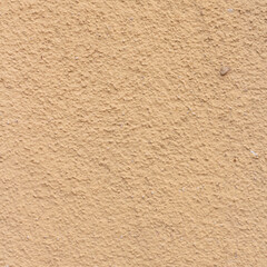 Colorful wall plaster of a facade in Venice, Italy