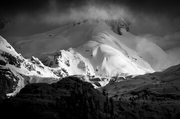 Snow on Mount Canin and Montasio. Black and white