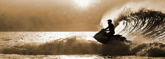 jetski rider in front of a huge wave against the sun, generative ai