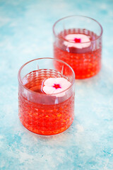 Alcohol cocktails on the turquoise background