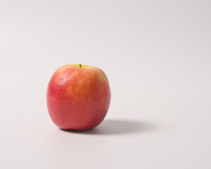 An apple with shadow isolated on white background.