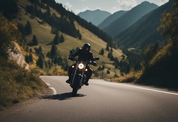 A motorcycle rider speeding on a mountain road
