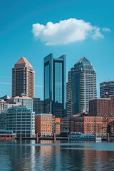 A scenic view of a city skyline as seen from across a body of water. This image can be used to depict the beauty and urban landscape of a city