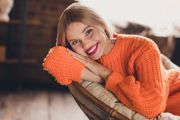Photo of pretty positive lady beaming smile good mood sit armchair spend free time morning...