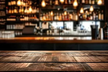 Tuinposter Bar table interior in pub with wooden counter background desk space blurred light for drink design cafe top in coffee restaurant vintage retro style wine shop brown alcohol abstract blurry kitchen © Thares2020