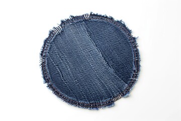 Frayed denim fabric with edges on a clean white background. Suitable for fashion, textile, or DIY projects