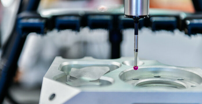 Close up automatic coordinate measurement machine (CMM) for inspection high precision engine block during working