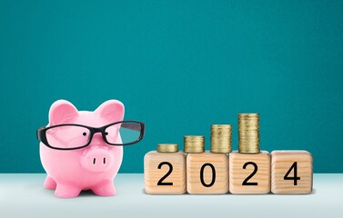 Happy 2024 New Year with pink piggy bank