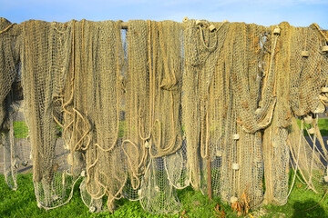 Curonian Spit, Lithuania - Juodkrante village - fishing port, fishing nets. Curonian Spit is UNESCO...