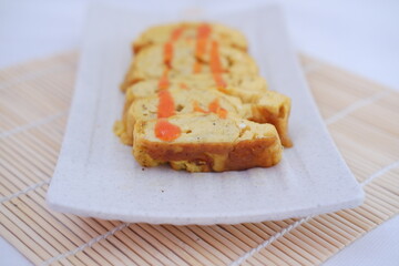 Slices of omelet on a plate 