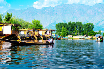 Dal Lake and the beautiful mountain range in the background, in the summer Boat Trip, of city Srinagar Kashmir India.
