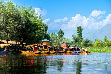 Dal Lake and the beautiful mountain range in the background, in the summer Boat Trip, of city...