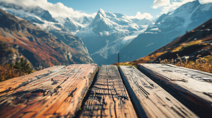 Wooden Table with Mountain Background - obrazy, fototapety, plakaty