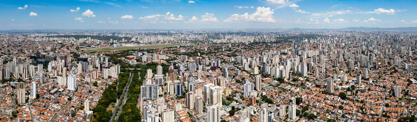 Fotobehang Big City landscape with airport São Paulo Brazil global south © Diego