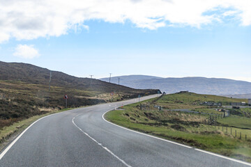 Winding Road Through Picturesque Rolling Hills