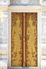 Architecture details of thai temple golden gate at Thailand.