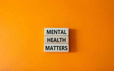 Mental Health Matters symbol. Concept words Mental Health Matters on wooden blocks. Beautiful...
