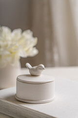 White box for small items in the interior of a white room