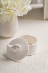 White box for small items in the interior of a white room